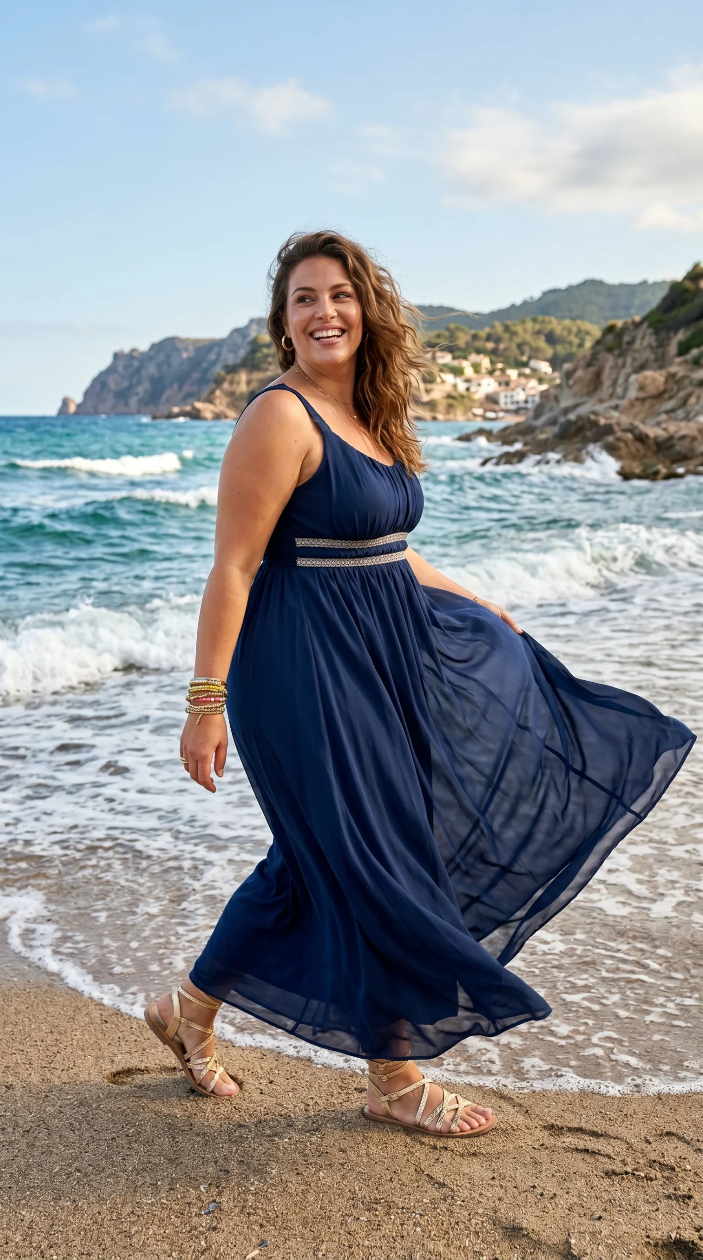 Woman in a flowing navy blue empire waist chiffon maxi dress
