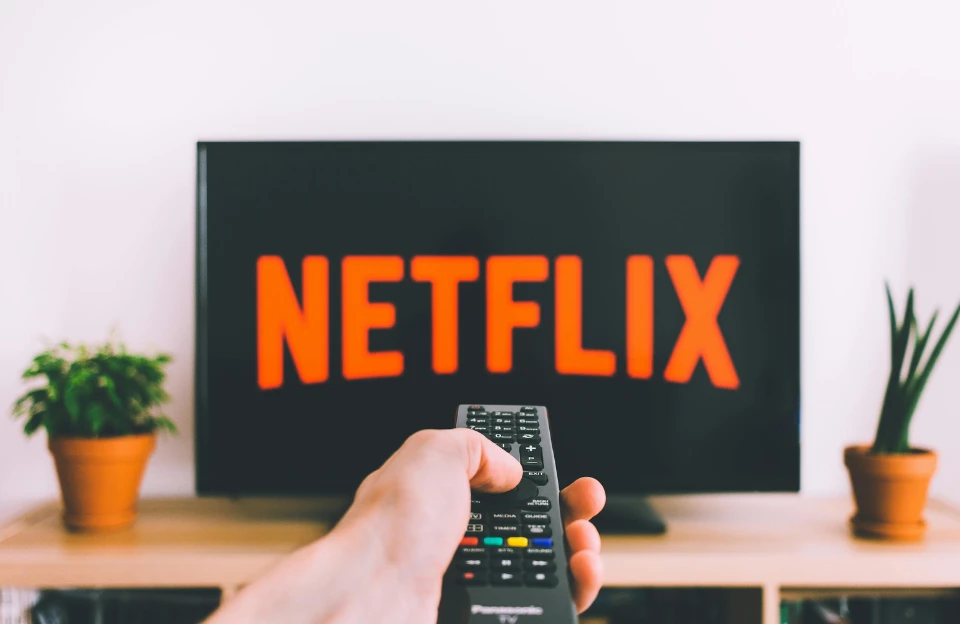 person watching documentaries on Netflix