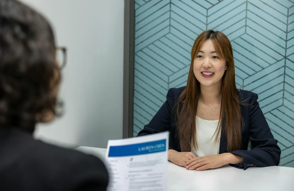 A Girl Confidently Giving Interview after Building Professional resume using ChatGPT